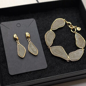 Erwin Pearl Greenish Grey Neutral tone and gold Leaf Drop Earrings + bracelet